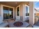 Relaxing patio with fire pit and seating area at 21778 N 259Th Ln, Buckeye, AZ 85396