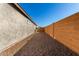 Side yard with gravel and block wall at 21778 N 259Th Ln, Buckeye, AZ 85396