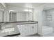 Modern bathroom with double vanity and soaking tub at 2227 E Catalina Dr, Phoenix, AZ 85016