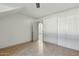 Well-lit bedroom with double door closet and tile floors at 2227 E Catalina Dr, Phoenix, AZ 85016