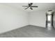 Bright bedroom with ceiling fan and wood-look flooring at 2227 E Catalina Dr, Phoenix, AZ 85016