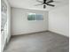 Spacious bedroom featuring a window and ceiling fan at 2227 E Catalina Dr, Phoenix, AZ 85016