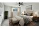 Spacious bedroom with plush bed and neutral decor at 2227 E Catalina Dr, Phoenix, AZ 85016