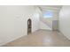 Spacious living area with high ceilings and tile floors at 2227 E Catalina Dr, Phoenix, AZ 85016