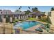 Community pool with lounge chairs and seating at 2227 E Catalina Dr, Phoenix, AZ 85016