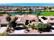 Aerial view of single-story home near lake at 23206 N Del Monte Dr, Sun City West, AZ 85375