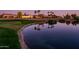Community with lake, golf course, and luxury homes at 23206 N Del Monte Dr, Sun City West, AZ 85375