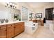 Spacious Primary bathroom with soaking tub, double sinks, and large vanity at 23206 N Del Monte Dr, Sun City West, AZ 85375