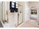 Bathroom with a walk-in shower, tile flooring, and access to backyard at 23206 N Del Monte Dr, Sun City West, AZ 85375