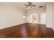 Main bedroom with hardwood floors and ensuite bathroom at 23206 N Del Monte Dr, Sun City West, AZ 85375