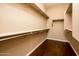 Large walk-in closet with ample shelving and hanging space at 23206 N Del Monte Dr, Sun City West, AZ 85375