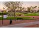 Golf course with a view of houses and palm trees at 23206 N Del Monte Dr, Sun City West, AZ 85375