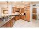 Bright kitchen with stainless steel appliances and granite countertops at 23206 N Del Monte Dr, Sun City West, AZ 85375