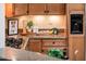 Stylish kitchen with granite countertops and wood cabinets at 23206 N Del Monte Dr, Sun City West, AZ 85375