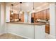 Spacious kitchen with granite countertops and modern appliances at 23206 N Del Monte Dr, Sun City West, AZ 85375