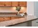 Kitchen boasts granite countertops and ample cabinet space at 23206 N Del Monte Dr, Sun City West, AZ 85375