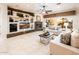 Spacious living room with fireplace and built-ins at 23206 N Del Monte Dr, Sun City West, AZ 85375