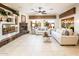 Spacious living room with fireplace and built-ins at 23206 N Del Monte Dr, Sun City West, AZ 85375