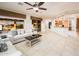 Living room, kitchen, and backyard view at 23206 N Del Monte Dr, Sun City West, AZ 85375