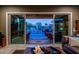 Inviting backyard with sparkling pool and patio seating at 26398 W Cat Balue Dr, Buckeye, AZ 85396