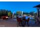 Entertaining backyard with pool, spa, and patio furniture at 26398 W Cat Balue Dr, Buckeye, AZ 85396