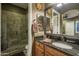 Guest bathroom with granite countertop and walk-in shower at 26398 W Cat Balue Dr, Buckeye, AZ 85396