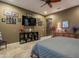 Spacious bedroom with decorative wall and dresser at 26398 W Cat Balue Dr, Buckeye, AZ 85396
