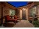 Charming courtyard with lounge chairs and brick flooring at 26398 W Cat Balue Dr, Buckeye, AZ 85396