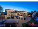 Outdoor kitchen with a built-in grill and pergola at 26398 W Cat Balue Dr, Buckeye, AZ 85396