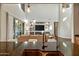 Kitchen with granite countertops, double sink, and views into the living room at 27410 N 16Th Ave, Phoenix, AZ 85085