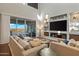 Bright living room with built-in shelving at 27410 N 16Th Ave, Phoenix, AZ 85085