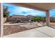 Backyard with a kidney-shaped pool and waterfall feature at 3109 E Denim Trl, San Tan Valley, AZ 85143