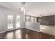 Dining area with hardwood floors and view into living room at 3109 E Denim Trl, San Tan Valley, AZ 85143