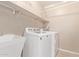 Laundry room with washer, dryer, and shelving at 3109 E Denim Trl, San Tan Valley, AZ 85143