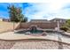 Inviting kidney-shaped pool with waterfall feature at 3109 E Denim Trl, San Tan Valley, AZ 85143