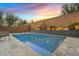 Luxury pool and patio area at sunset at 31509 N 55Th Way, Cave Creek, AZ 85331