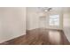 Spacious living room featuring hardwood floors and a ceiling fan at 3635 W Firehawk Dr, Glendale, AZ 85308