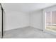 Bedroom with mirrored closet and window at 3828 N 32Nd St # 120, Phoenix, AZ 85018