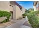 Building exterior showcasing landscaping and walkway at 3828 N 32Nd St # 120, Phoenix, AZ 85018