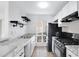 Updated kitchen featuring white cabinets and granite countertops at 3828 N 32Nd St # 120, Phoenix, AZ 85018