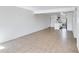 Bright living room with tile floors and kitchen access at 3828 N 32Nd St # 120, Phoenix, AZ 85018