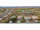 An exterior aerial view of a home with landscaping, mountain views and desert charm at 41512 N Tangle Ridge Ct, Anthem, AZ 85086
