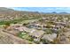 A beautiful aerial view of the home, with a manicured backyard and nice patio seating at 41512 N Tangle Ridge Ct, Anthem, AZ 85086