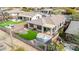 Aerial view of this backyard featuring desert landscaping, an outdoor kitchen, and a seating area at 41512 N Tangle Ridge Ct, Anthem, AZ 85086