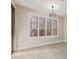 Bright dining area with large windows and plantation shutters at 41512 N Tangle Ridge Ct, Anthem, AZ 85086