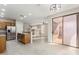 Open kitchen features stainless steel appliances and an island at 41512 N Tangle Ridge Ct, Anthem, AZ 85086