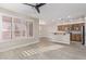 Kitchen features a breakfast bar and wood cabinets at 41512 N Tangle Ridge Ct, Anthem, AZ 85086