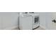 Laundry room with side-by-side washer and dryer at 41512 N Tangle Ridge Ct, Anthem, AZ 85086