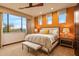 Bright bedroom with large windows, comfortable bed, and plenty of natural light at 41686 N 110Th Way, Scottsdale, AZ 85262