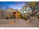 Luxury home's exterior entrance with pathway, landscaping, and lighting at 41686 N 110Th Way, Scottsdale, AZ 85262